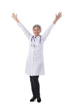 Asian mature female medical doctor with stethoscope with raised arms isolated on white background