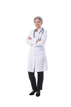 Female mature asian doctor standing with arms crossed isolated on white background full length portrait
