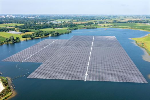 Aerial view from solar panels on a lake in the countryside from the Netherlands