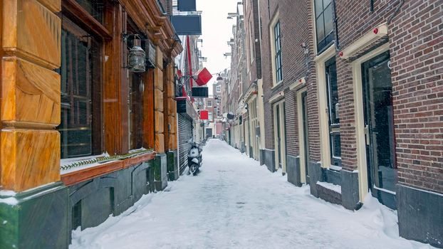 Snowy Red LIght District in winter in Amsterdam the Netherlands