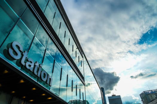 Shinjuku Station and autumn sunny sky. Shooting Location: Tokyo metropolitan area