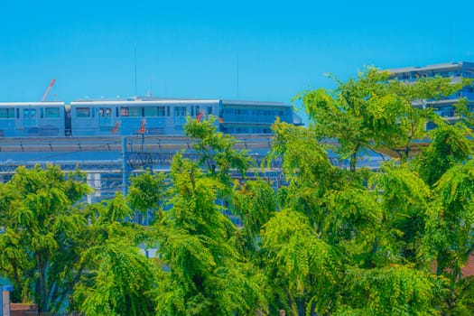 Tama city monorail and fresh green (Tama Center). Shooting Location: Tokyo metropolitan area