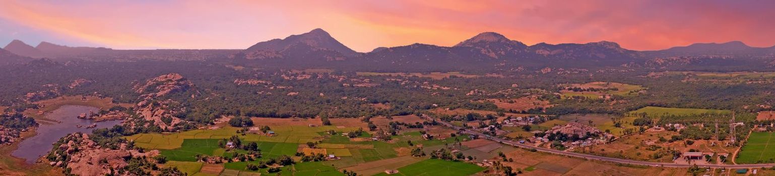 Panoramic view from Gingee Fort, Thiruvannamalai in Tamil Nadu India at sunset
Known as the "Troy of the East" by the British, Gingee Fort rises out of the Tamilian plains. Lying in Villupuram District of Tamil Nadu in India