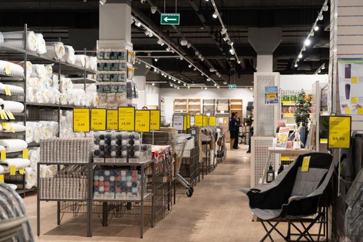 Grodno, Belarus - April 07, 2021: Interior of JYSK store in mall Triniti. Department for the sale of garden furniture and tools.