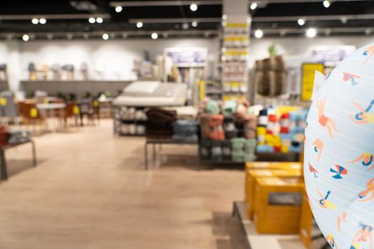 Grodno, Belarus - April 07, 2021: Interior of JYSK store in mall Triniti. Department for the sale of blankets and pillows.