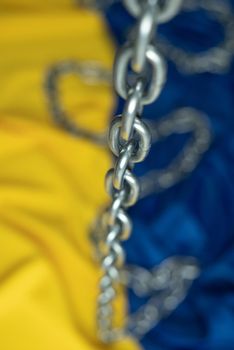 the yellow and blue Ukrainian flag with chain