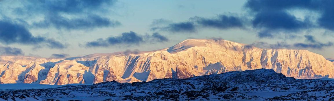 Beautiful landscape with snow covered mountains