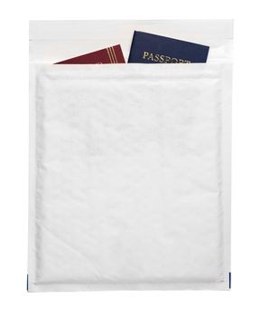 Passport spread in a white paper envelope, Travel concept. Top view.