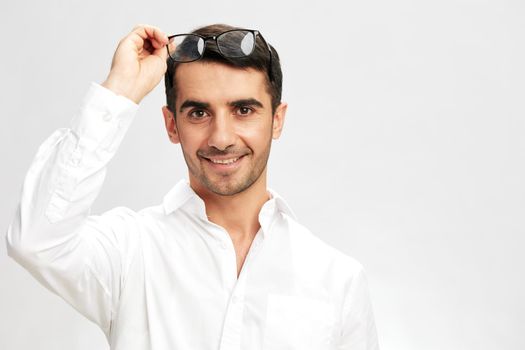 businessmen glasses on the head in white shirts hand gesture copy-space elegant style. High quality photo