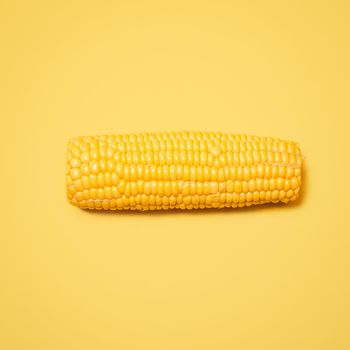 Shot of a cob of corn against a studio background.