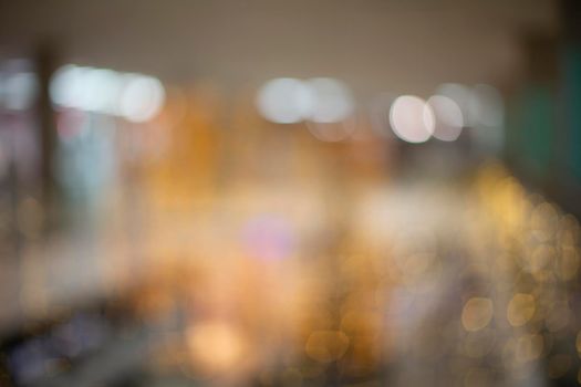 Blurred background of city lights. Golden blurred bokeh.