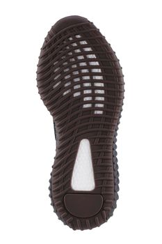 The semi-veritan sole of the shoe is black with white stripes.