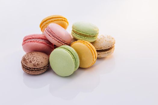 Multicolor macarons , French macaroon, greedy pastry. Multicolored Macarons Cookies. Food concept