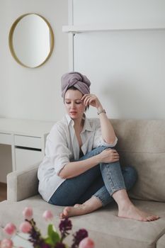 Cozy spring vibes. Woman enjoying morning at home, sitting and dreaming, relaxed mood. stay home, lifestyle