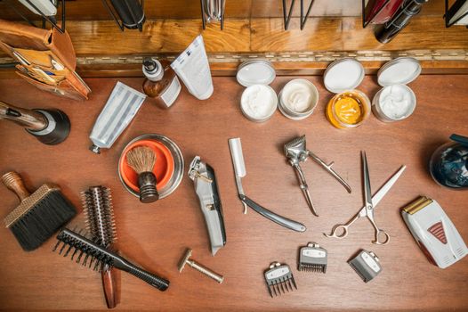 Top view barber tools on the shelf in the barbershop. High quality photography