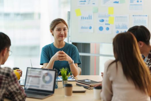 Multiracial corporate business team discuss and consult to offer new idea at exclusive meeting room. finance concept