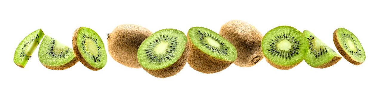 Kiwi fruit levitating on a white background.