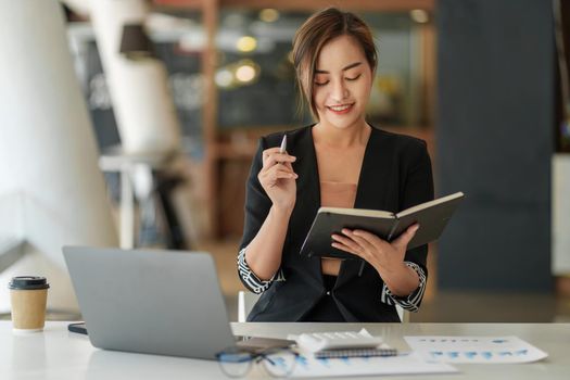 Business woman focus thinking new idea for make ads to present new product