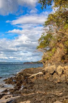 pacific ocean on Playa Todo Aventura, El Coco Costa Rica. Famous snorkel beach. Picturesque paradise tropical landscape of Costa Rica beach. Pura Vida concept, travel to exotic tropical country.