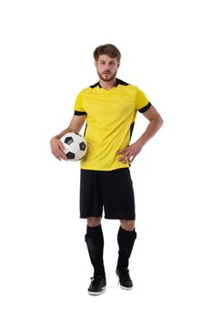 Full length portrait of a soccer player with ball isolated on white background