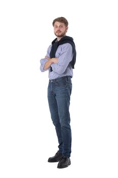 Full length portrait of handsome young business man in casual wear standing with arms folded isolated on white background, casual people