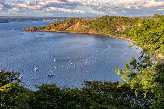 pacific ocean on Playa Poor Calzon Beach, El Coco Costa Rica. Picturesque paradise tropical landscape of Costa Rica beach. Pura Vida concept, travel to exotic tropical country.