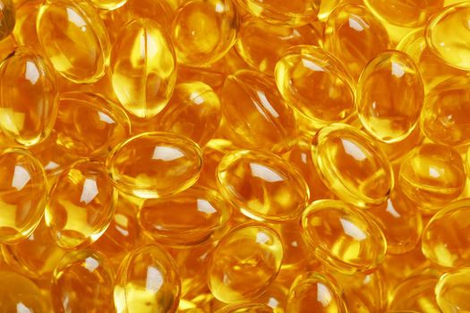 Background of capsules in a shell with vitamin Omega 3 Fish oil in full screen