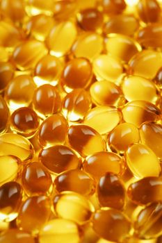 Background of capsules in a shell with vitamin Omega 3 Fish oil in full screen