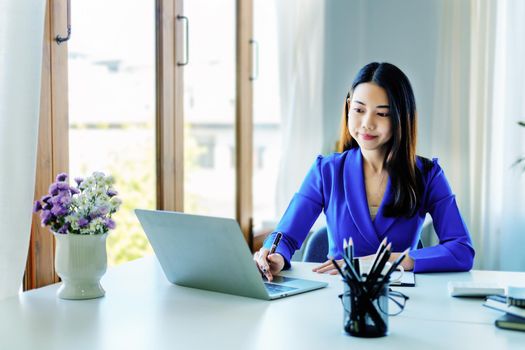 analytics, search, research, stock trading using computers, female employees using computer keyboards to work on financial statements and investments for the company they work for