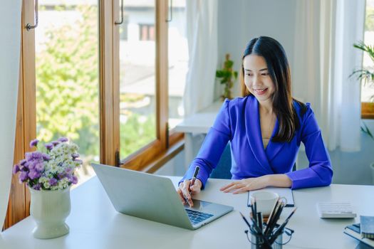 analytics, search, research, stock trading using computers, female employees using computer keyboards to work on financial statements and investments for the company they work for