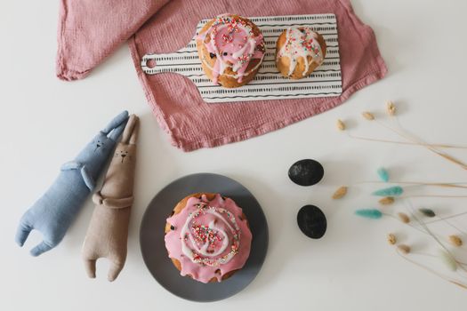 Easter cake, colorful eggs and rabbit toy. Happy Easter holiday concept. festive spring season.