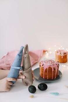 Easter cake, colorful eggs and rabbit toy. Happy Easter holiday concept. festive spring season.
