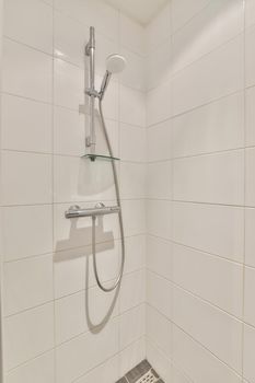 Total white bathroom. Compact bathroom with shower