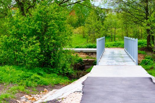 Iron footbridge over the river