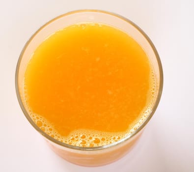 top view of orange juice glass (close up)
