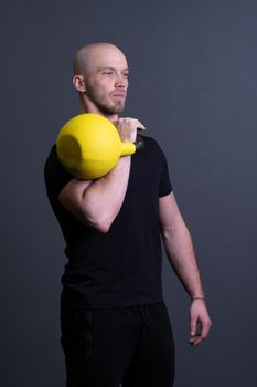 Guy with a yellow kettlebell gym anonymous young strength, from fit teenager for men from up youth, asian filipino. Living bent health, circuit hiit