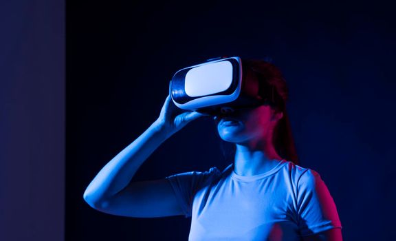 Woman developer, designerm architector using VR headset to designing a new products or technologies using VR technology