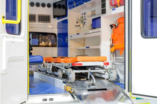 Inside an ambulance with medical equipment for helping patients before delivery to the hospital