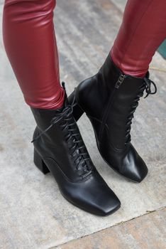 Amaze low lace up square toe block heel ankle black leather boots. top view. top view.