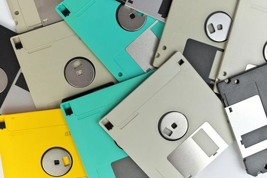 Directly Above Full Frame Close up of 3.5 Inch Floppy disks for background. Retro digital storage technology.