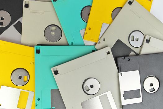 Directly Above Full Frame Close up of 3.5 Inch Floppy disks for background. Retro digital storage technology.