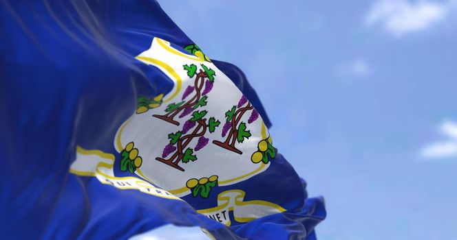 The state flag of Connecticut waving in the wind. Connecticut is the southernmost state in the New England region of the United States. Democracy and independence. US state.