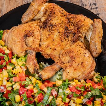 Chicken recipe, roast cockerel and its vegetables, corn condiment, High quality photo