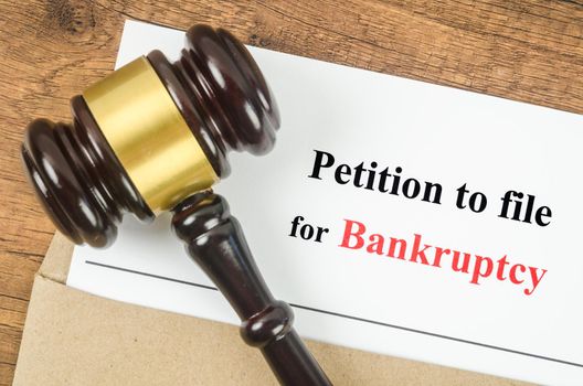 The Wooden Gavel and bankruptcy file documents. Law Concepts.