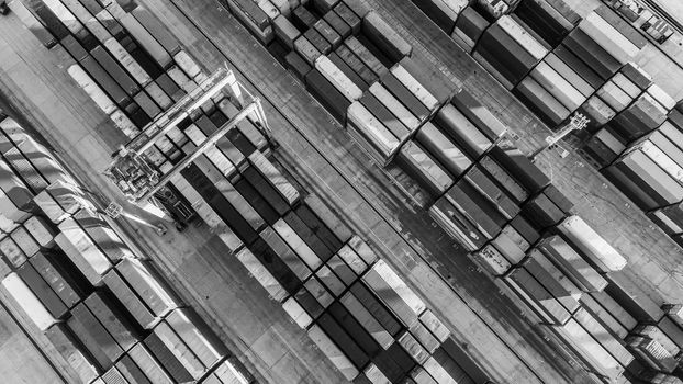 Aerial view of shipping container port terminal. Colourful pattern of containers in harbor. Maritime logistics global inport export trade transportation