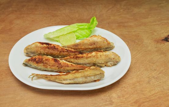 delicious crispy fried capelin fish and chips with garlic sauce