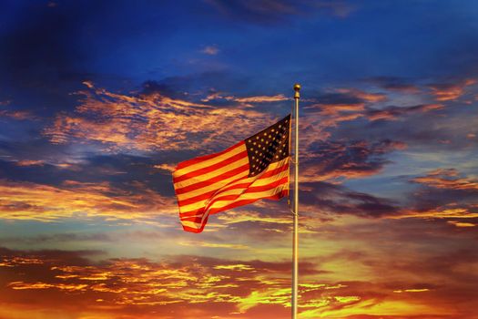 American flag in front of bright sky Night sunset red sky