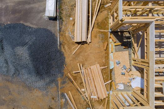 Aerial view the building construction wood framing beams of a new house under construction