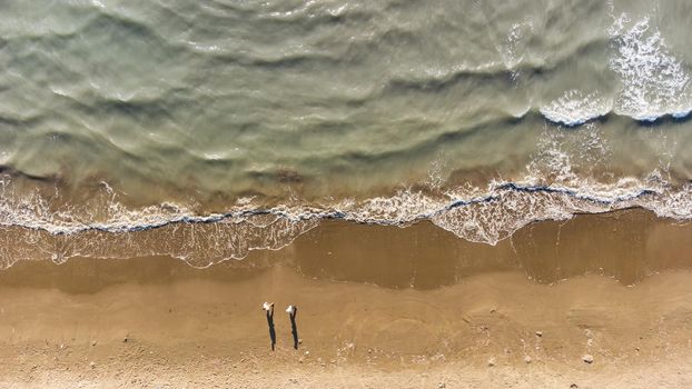 Soft wave of the sea on the sandy beach.