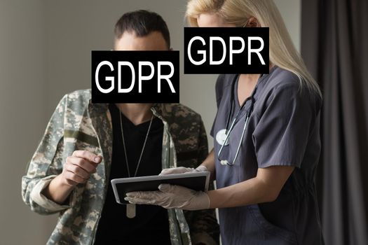 GDPR (general data protection regulation) concept. Businessman or IT technologist with text GDPR and icons of people.